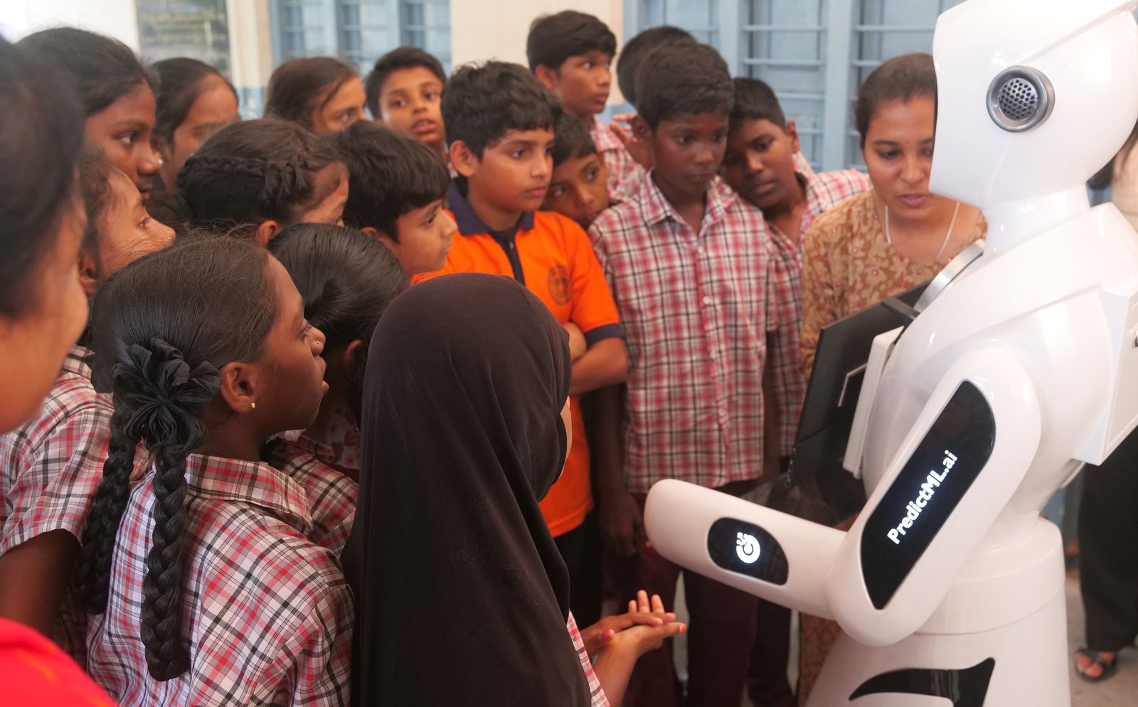 Students gathered around EDUBOT at Gandipet Government School